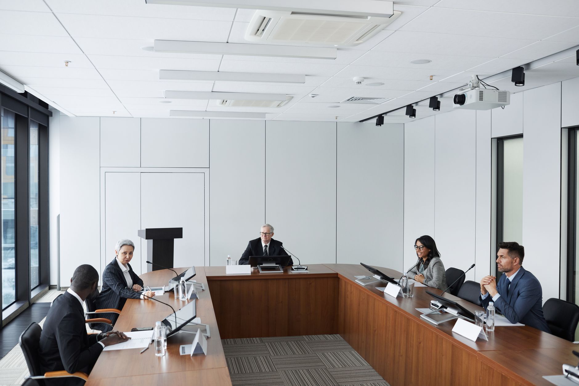 Elegant corporate board meeting cinematic profile shot